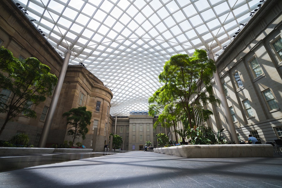 The glass-canopied Kogod Courtyard connects the Smithsonian American Art Museum and National Portrait Gallery.