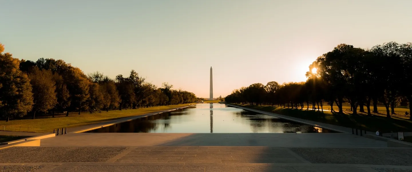 An evening view of the Reflecting Pool, with the Washington Monument in the distance. 