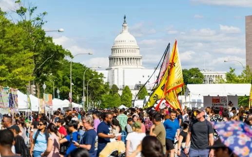 Crowds gather for a festival on Pennsylvania Avenue in DC.
